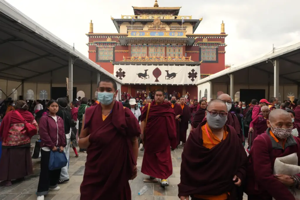 U.S.-born Buddhist lama Jalue Dorje walks out of Shechen Monastery...