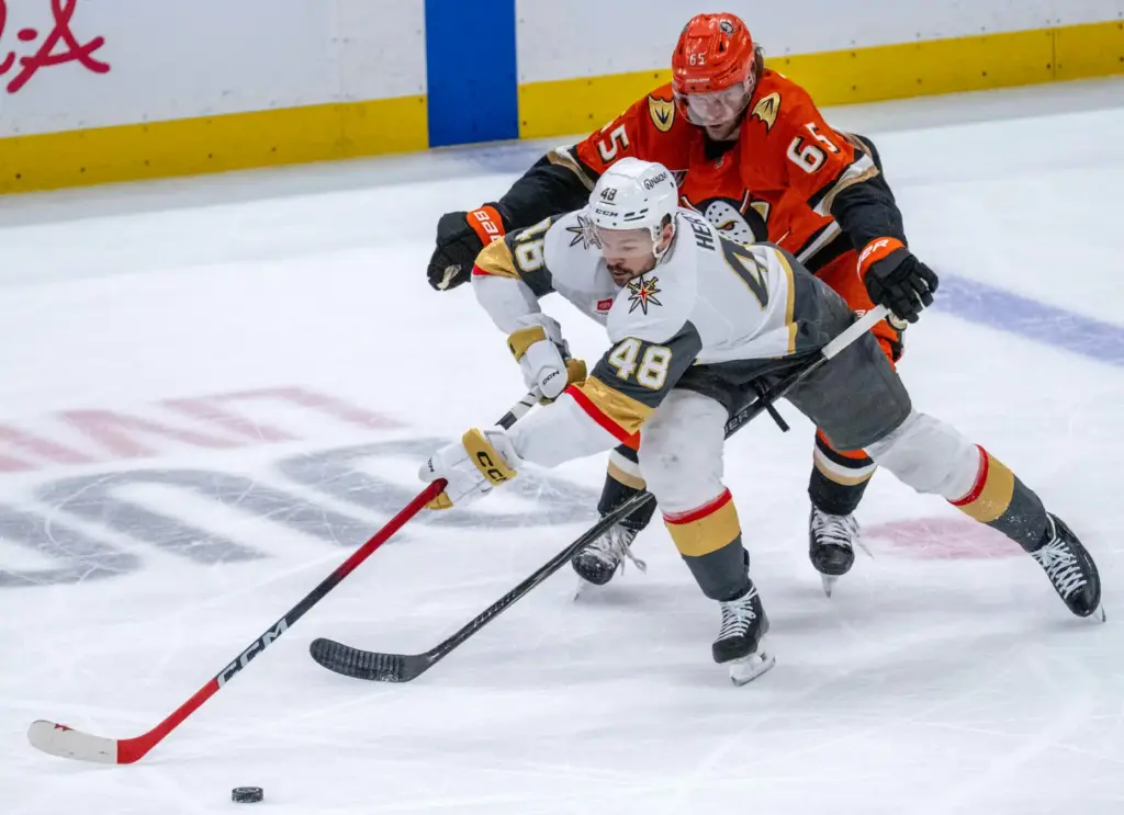The Vegas Golden Knightsâ Tomas Hertl, left, controls the puck...