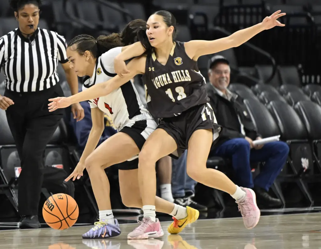 Lena Goodman #13 of Laguna Hills reaches for the ball...