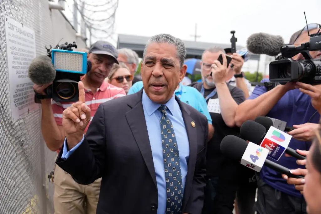 Rep. Adriano Espaillat, D-N.Y., speaks to reporters outside the Delaney...