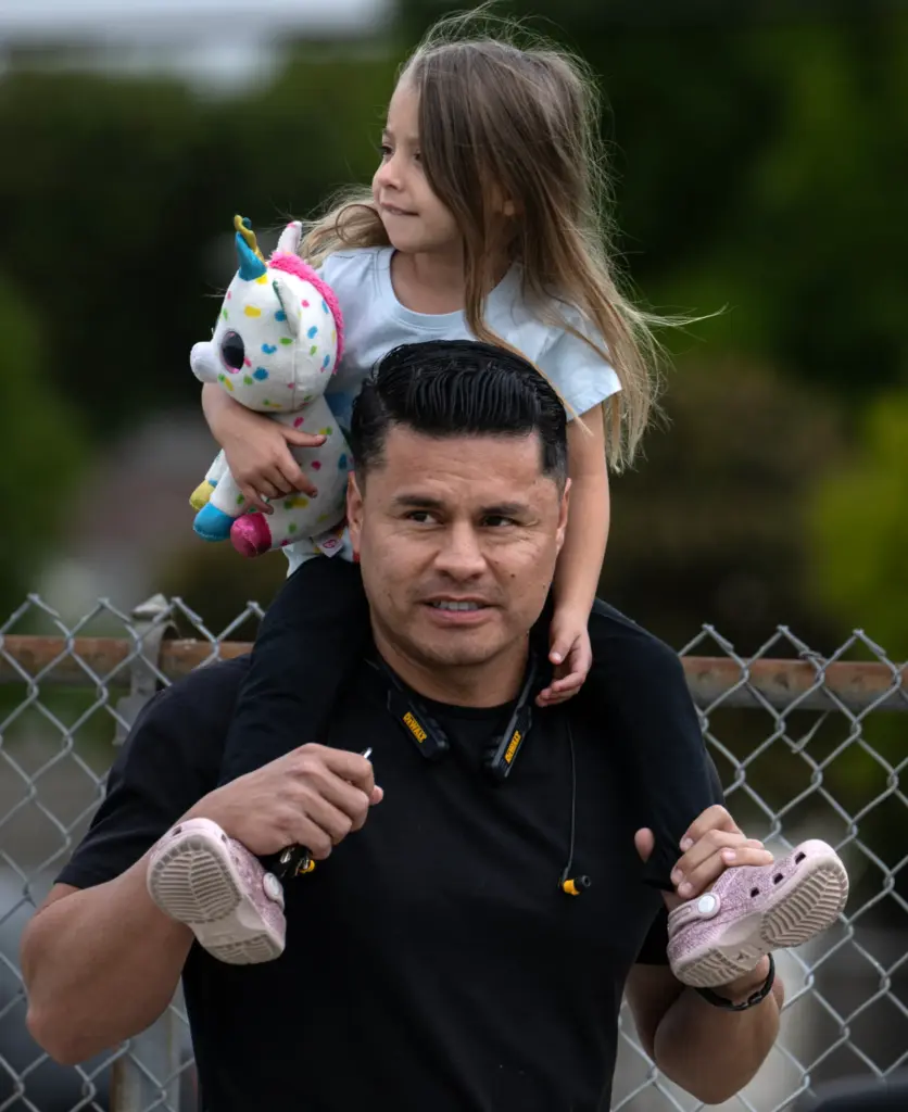 After dropping his second-grade daughter off at her Garden Grove...