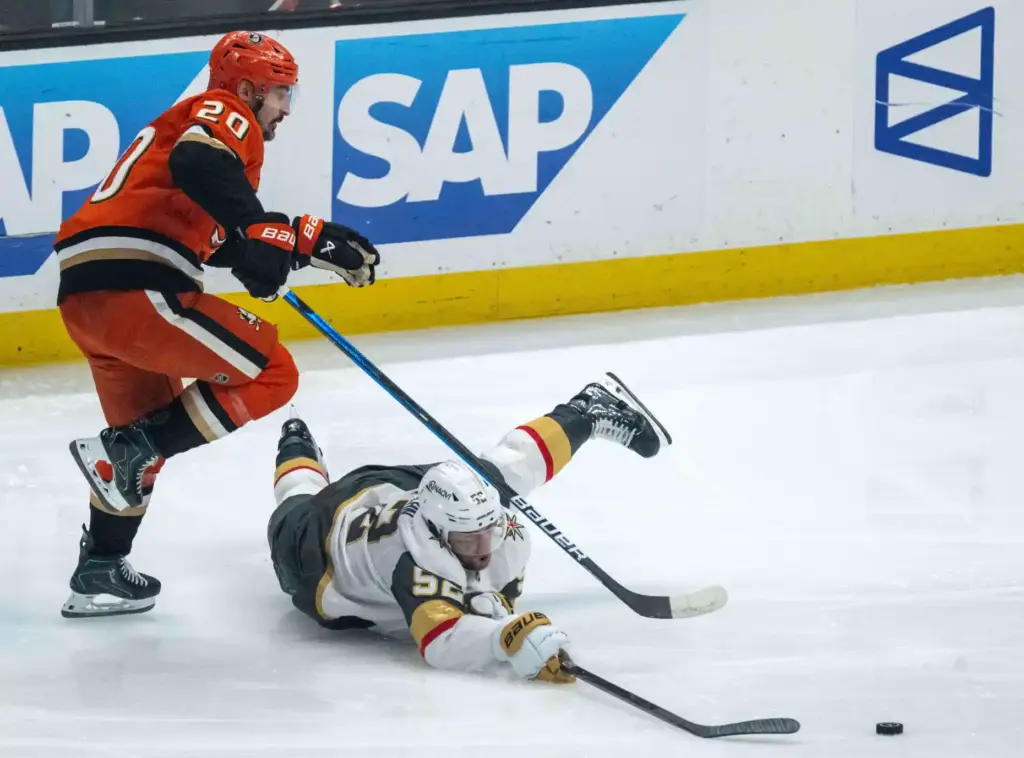 The Ducksâ Chris Kreider, left, and the Vegas Golden Knights’...