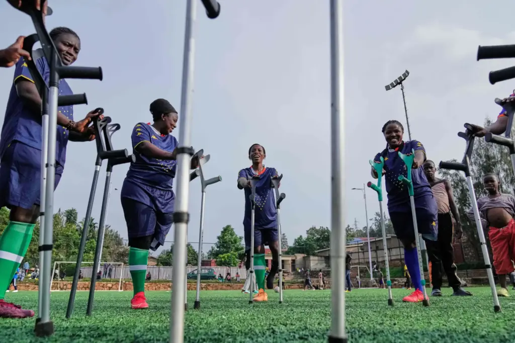 Soccer players on the Rwanda Amputee team take part in...