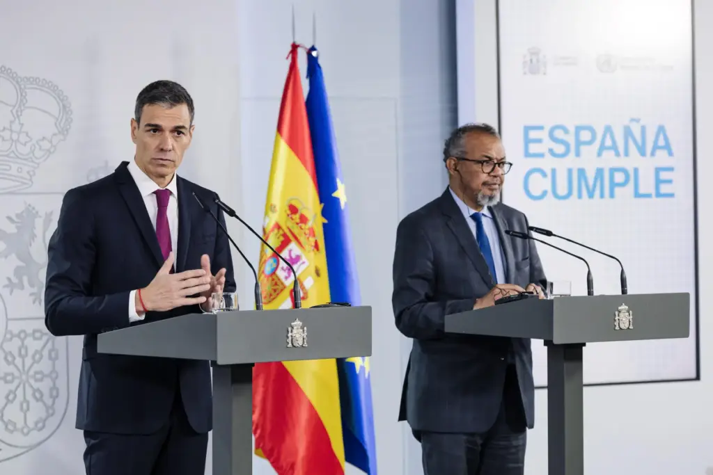 Spain's Prime Minister Pedro SÃ¡nchez and Director General of the World Health Organization Tedros Adhanom Ghebreyesus.