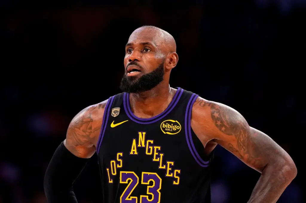 Lakers star LeBron James stands on the court during the...