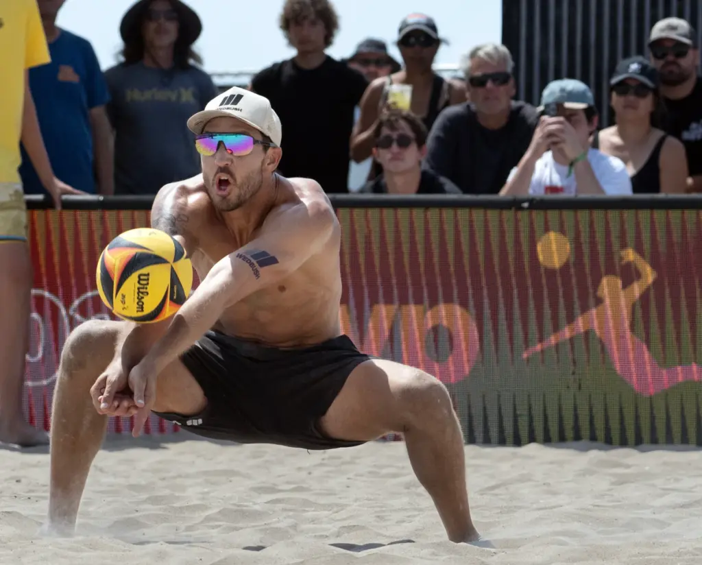Miles Evans gets down low during the AVP womenâs finals...