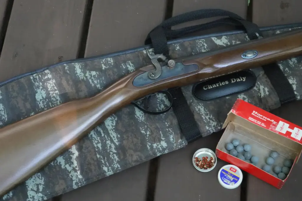 A .50-caliber Hawken replica rifle with lead balls and percussion...