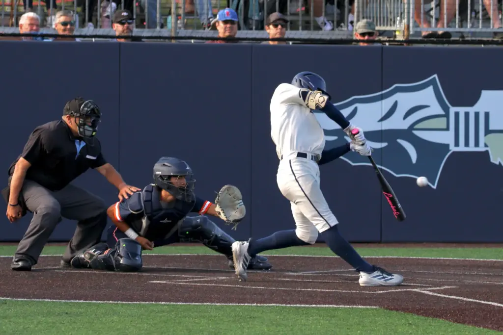 St. John Bosco senior first baseman Moises Razo strokes an...