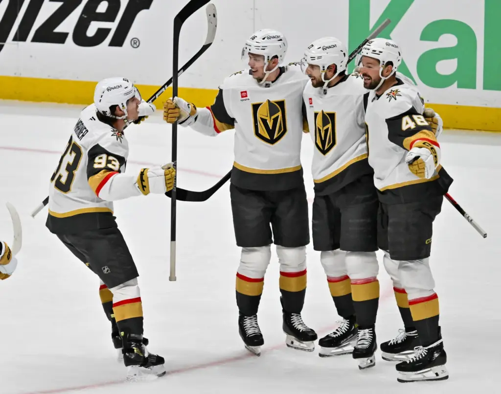 The Vegas Golden Knights’ Mitch Marner, left, celebrates a goal...