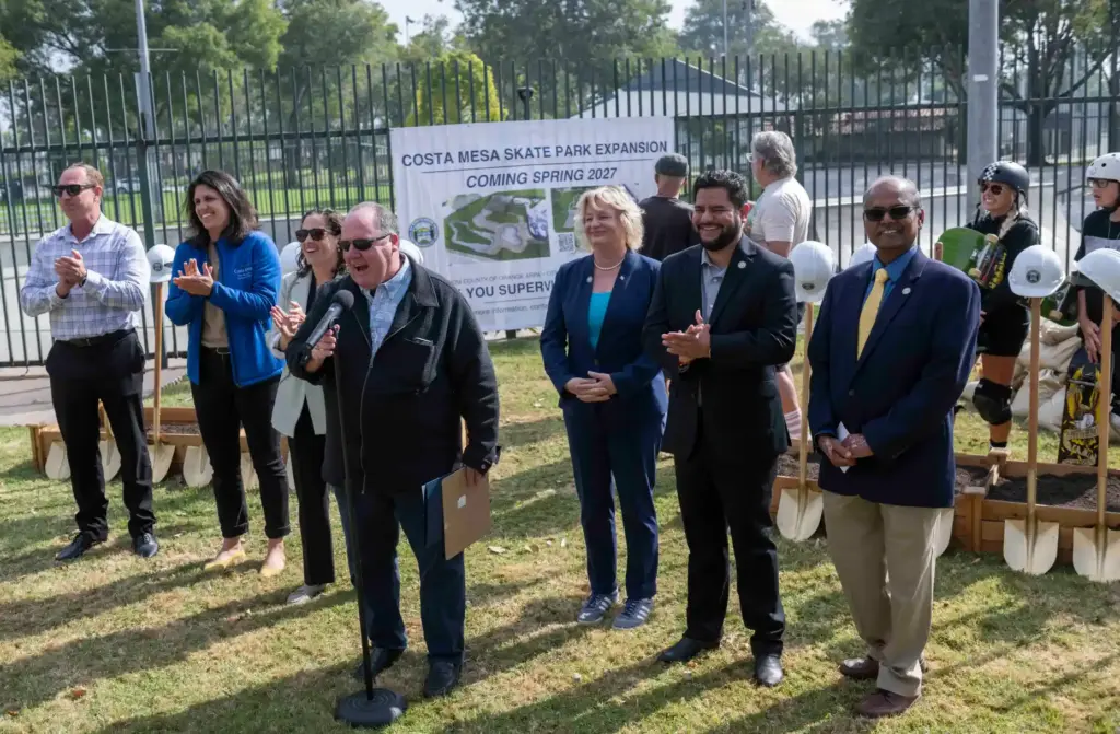 Joined by Supervisor Katrina Foley, center right, and city officials,...