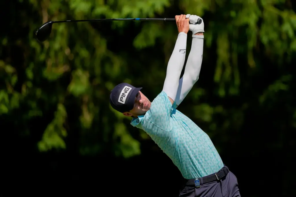 Alex Smalley hits from the fourth tee during the third...