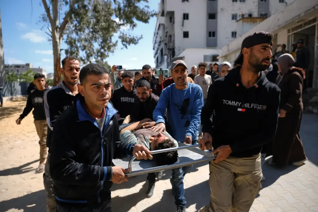 The body of Hamdan Kashko, who was killed in an Israeli airstrike, is taken to a hospital.