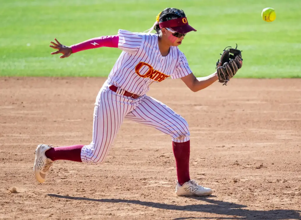 Oxnard shortstop Kayla Lorona canât quite hold onto the ball...