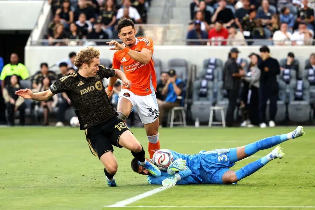 Los Angeles FC forward Jacob Shaffelburg (18) attempts to kick...