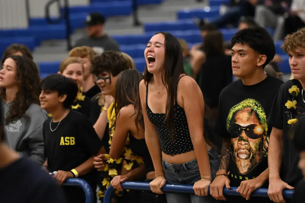 Sunny Hills fans celebrate after the Sunny Hills Lancers defeated...