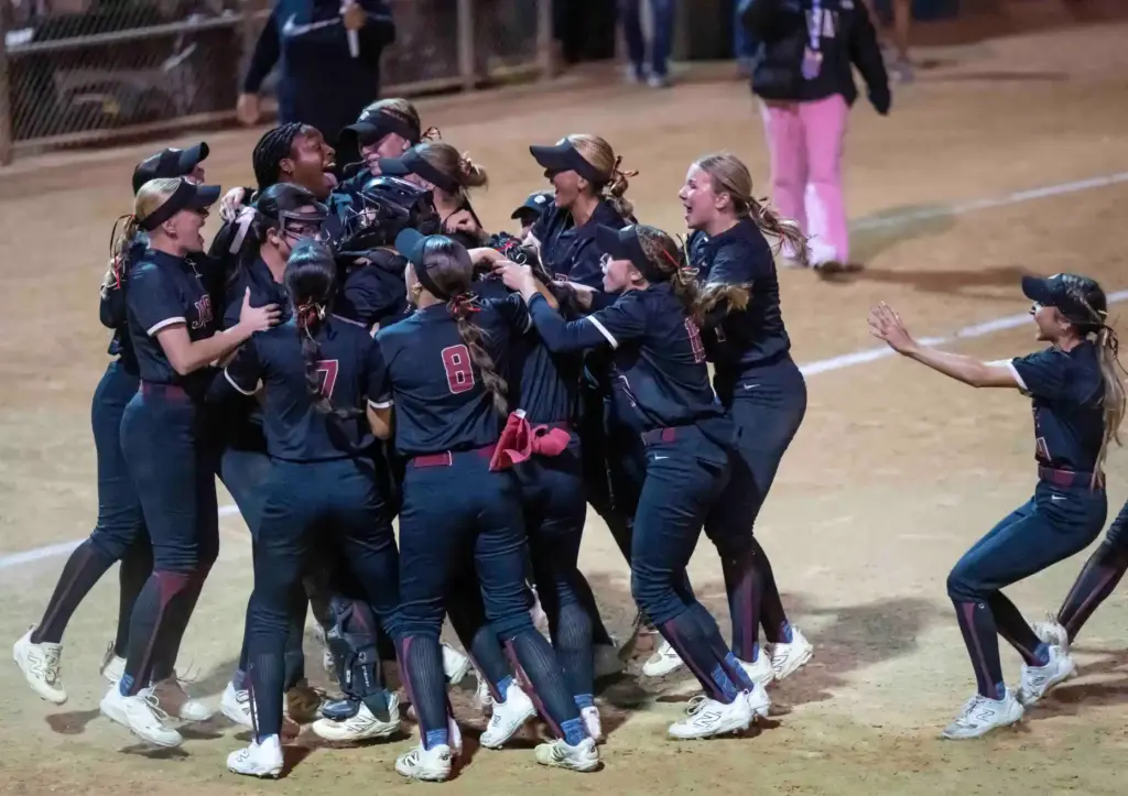 JSerra players celebrate after beating La Mirada 3-2 to win...