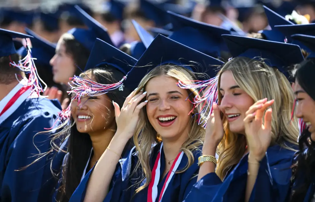 Graduatesâ tassels blow in the wind during the commencement ceremony...