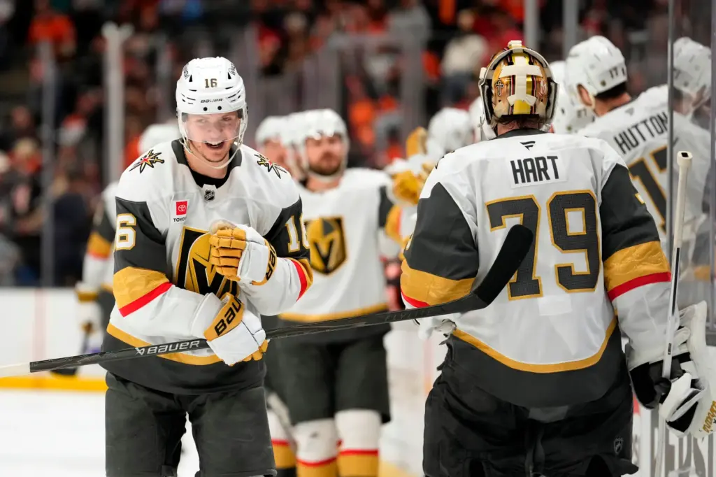 Vegas Golden Knights right wing Pavel Dorofeyev, left, celebrates his...