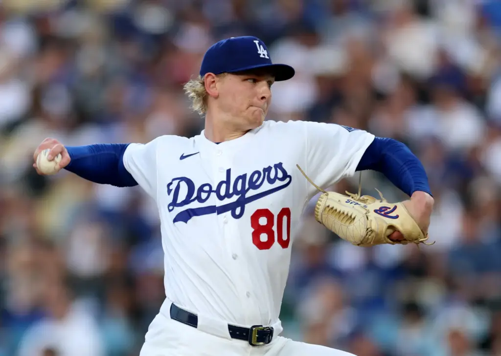 Dodgers starting pitcher Emmet Sheehan throws to the plate during...