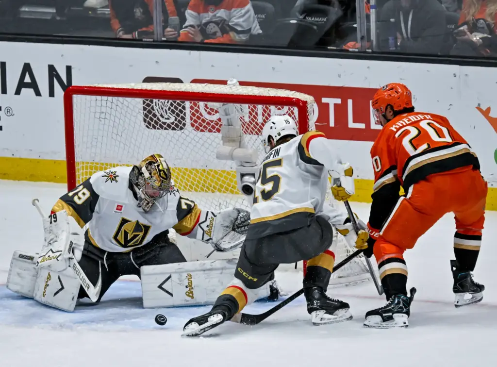 The Ducksâ Chris Kreider, right, has his shot on goal...