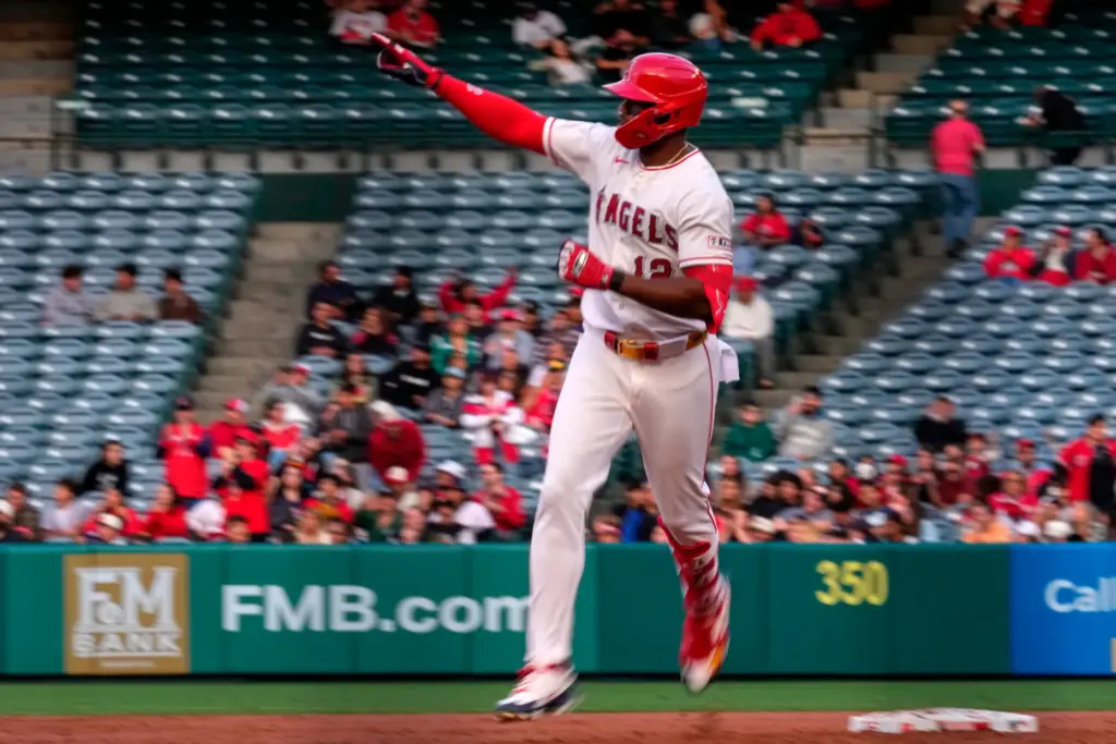 The Angels’ Jorge Soler gestures as he runs the bases...