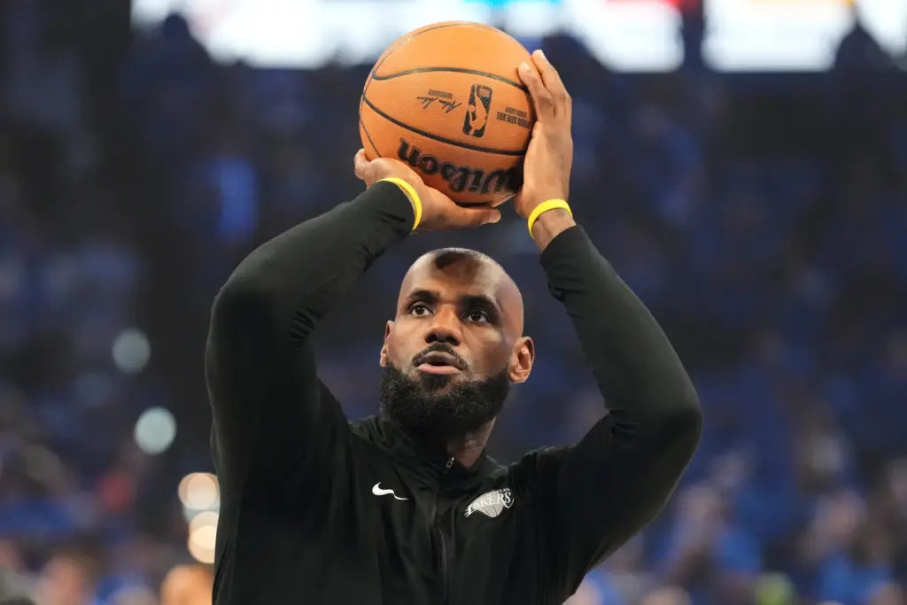 Lakers star LeBron James shoots during warmups before Game 1...