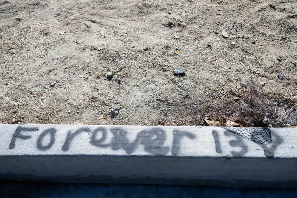 Messages are left at the crash site where a 13-year-old...