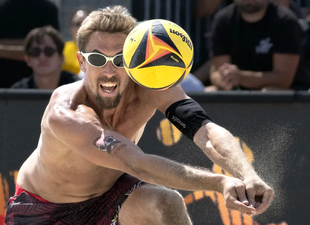 Taylor Crabb returns the ball during the AVP menâs finals...