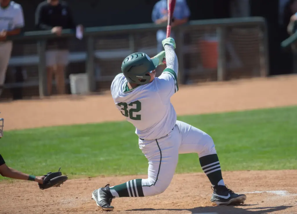 Schurrâs Joseph Tapia,(#32), hits a pinch-hit single against Rancho Alamitos,...