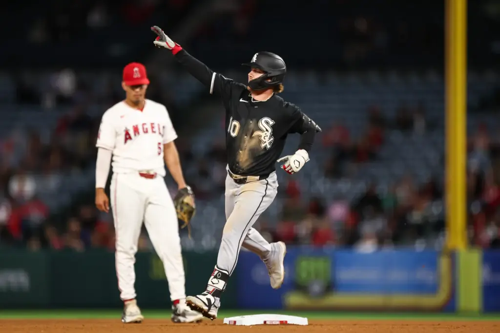 The Chicago White Sox’s Chase Meidroth celebrates as he runs...