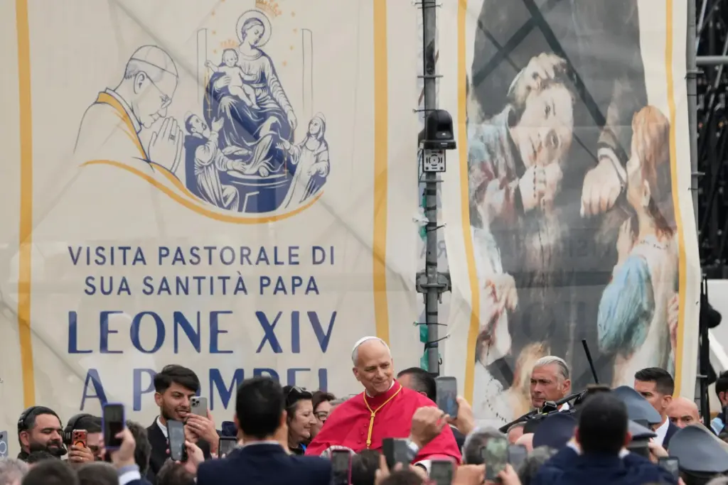 Pope Leo XIV greets faithful during his pastoral visit in Pompeii, Italy.