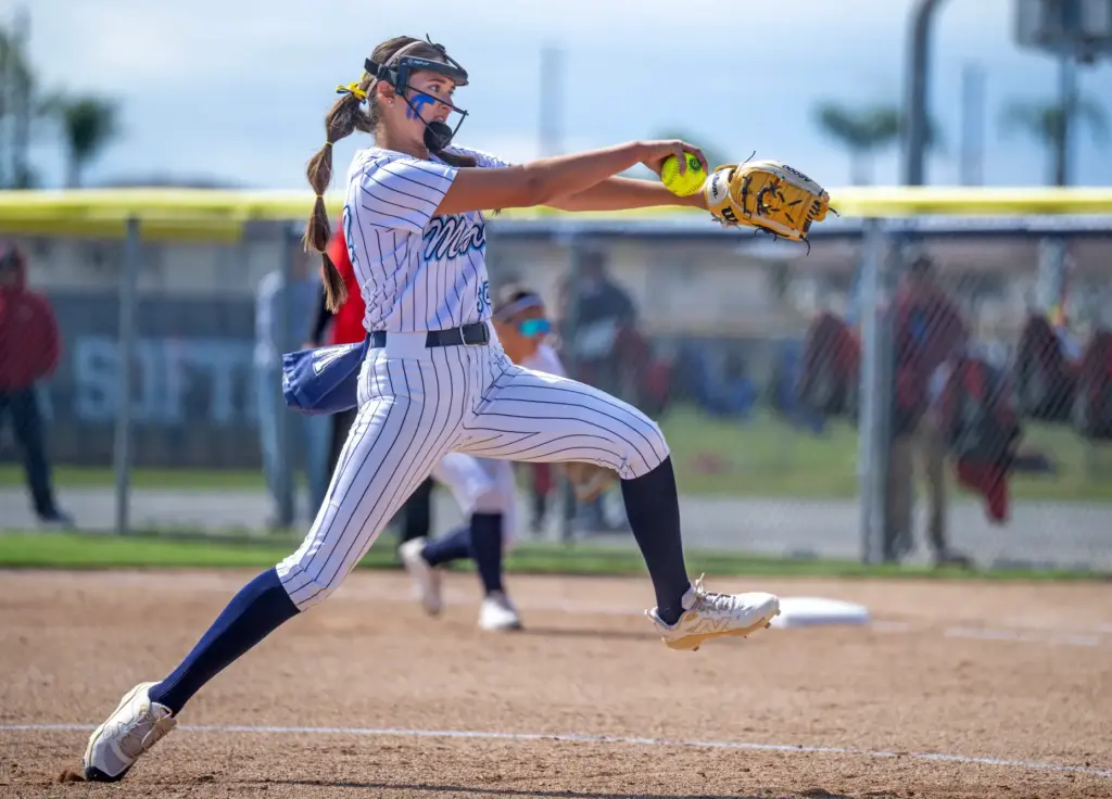 Marinaâs Mia Valbuena, who pitched the whole game, throws to...