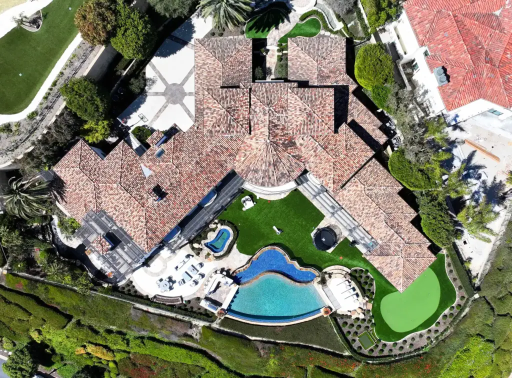 An 11,200 square feet Newport Coast estate in the gated...