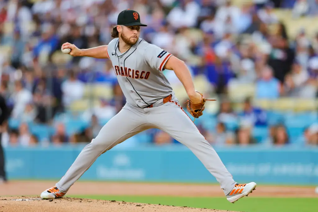 San Francisco Giants starting pitcher Landen Roupp throws to the...
