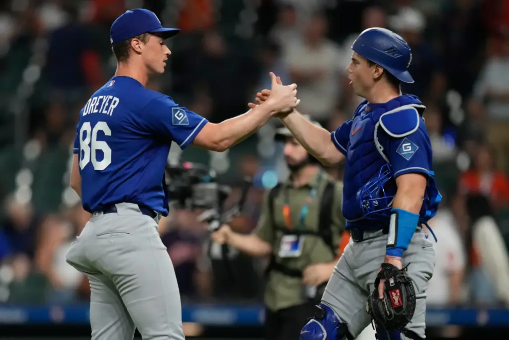 Dodgers relief pitcher Jack Dreyer, left, celebrates with catcher Will...