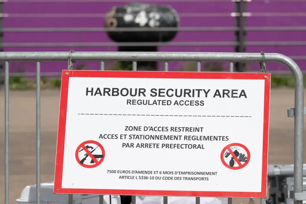 A barrier is set in front of the British cruise ship Ambition.