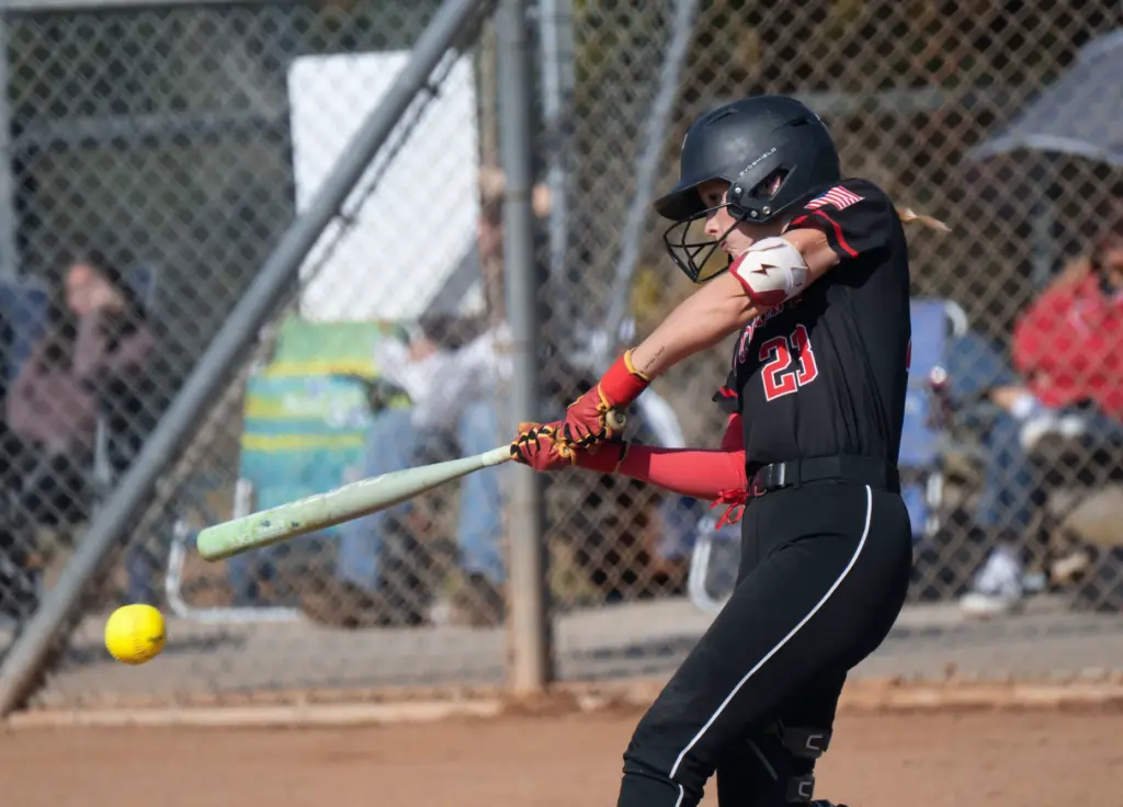 San Clemente’s Kennedy Pyne makes contact trying to get something...