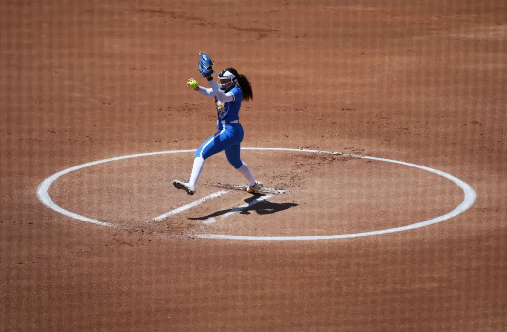 UCLAâs Taylor Tinsley pitches against South Carolina during the NCAA...