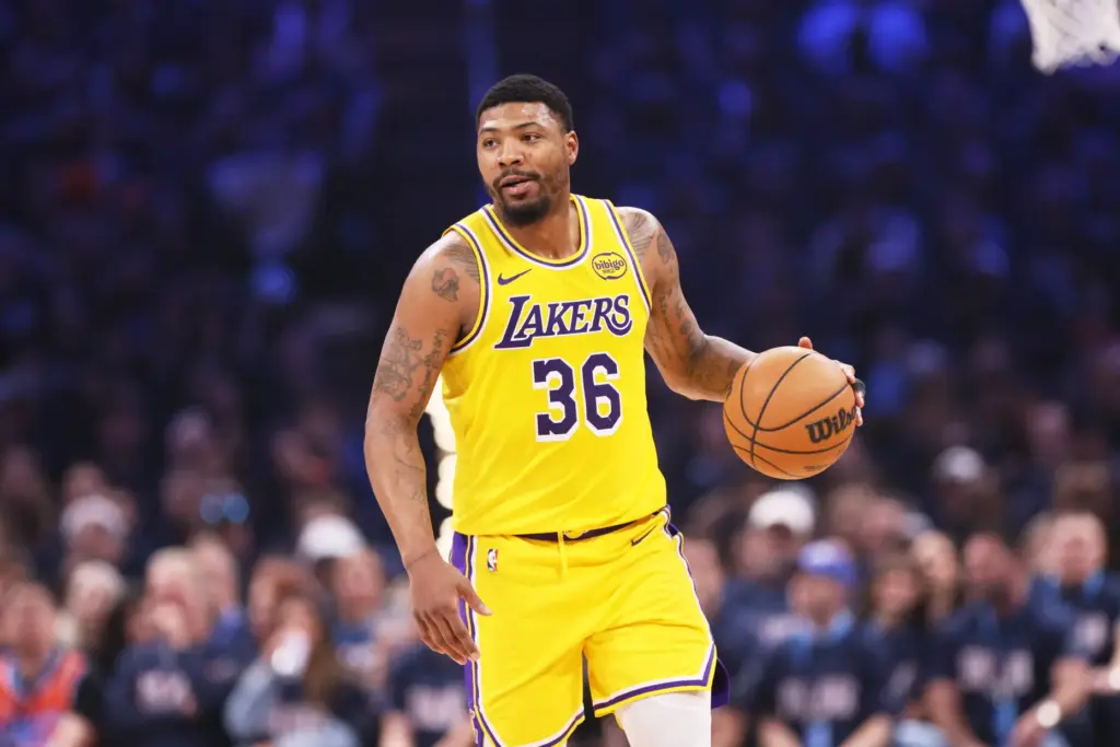 Los Angeles Lakers guard Marcus Smart handles the ball in...
