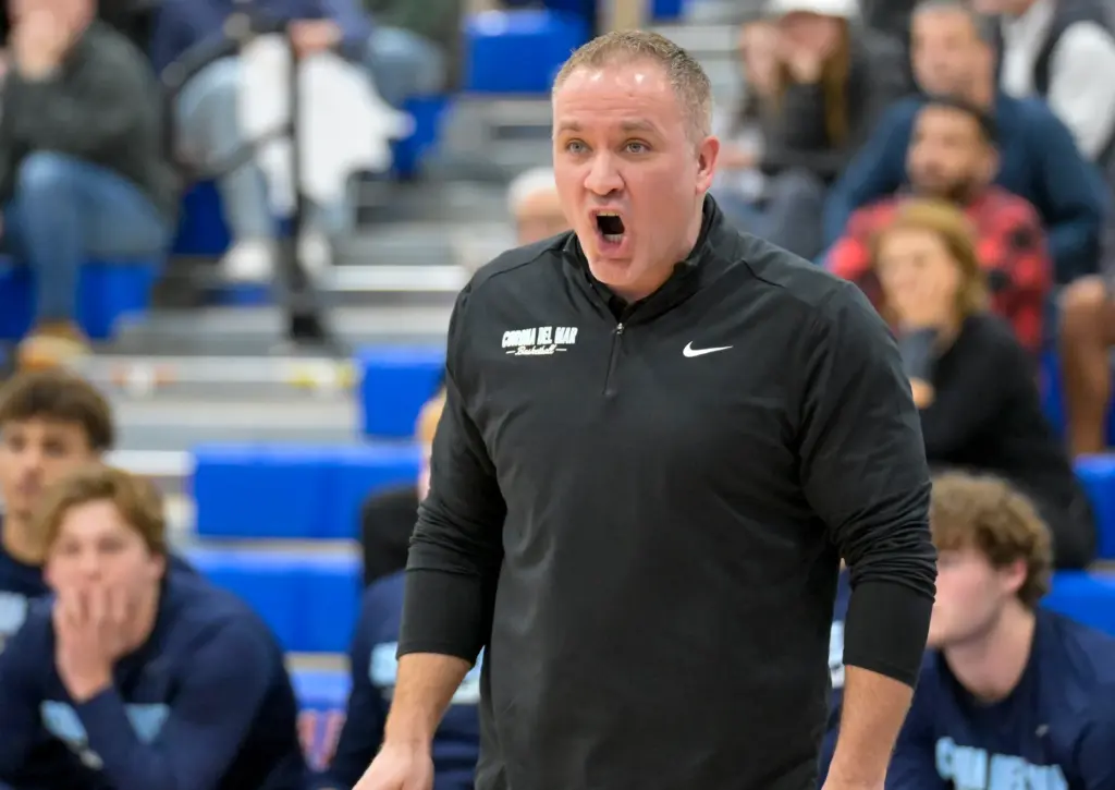 Corona del Mar head basketball coach Jason Simco during a...