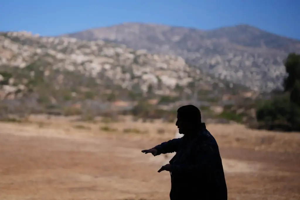 Norma Meza Calles, a Kumeyaay Nation leader, gestures as she...