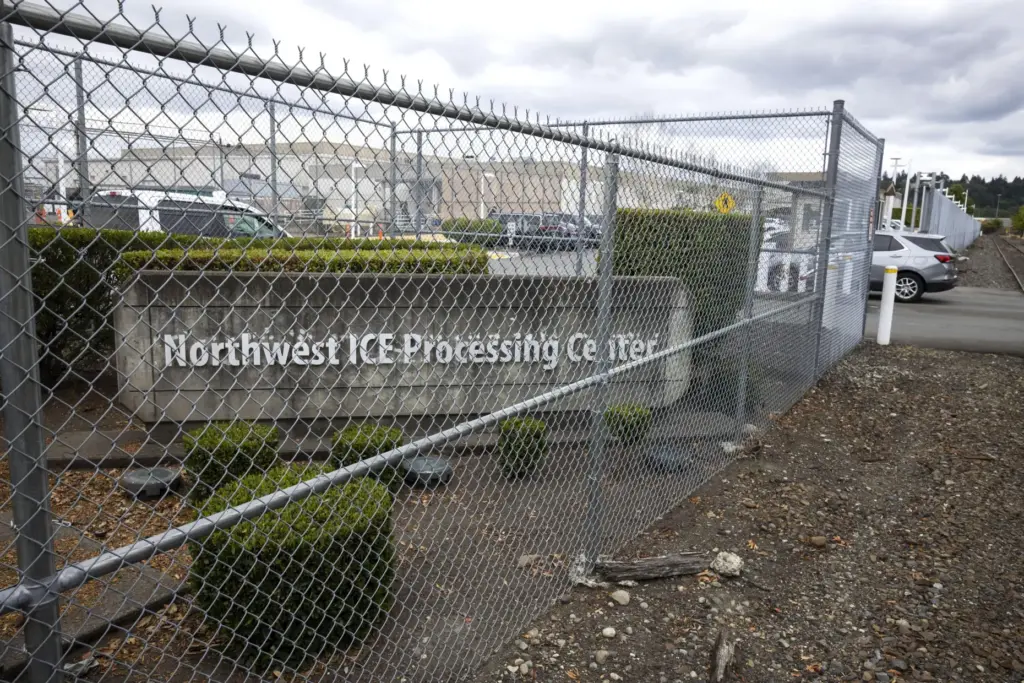 A vehicle pulls into the Northwest ICE Processing Center in Tacoma, Washington.