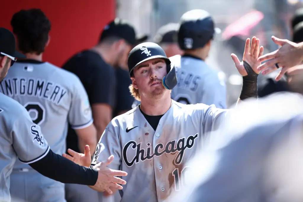 The Chicago White Sox’s Chase Meidroth celebrates with teammates in...