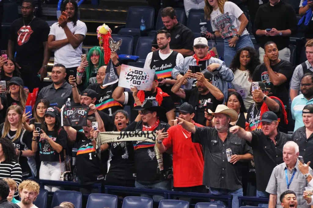 San Antonio Spurs fans celebrate after they defeated the Oklahoma...