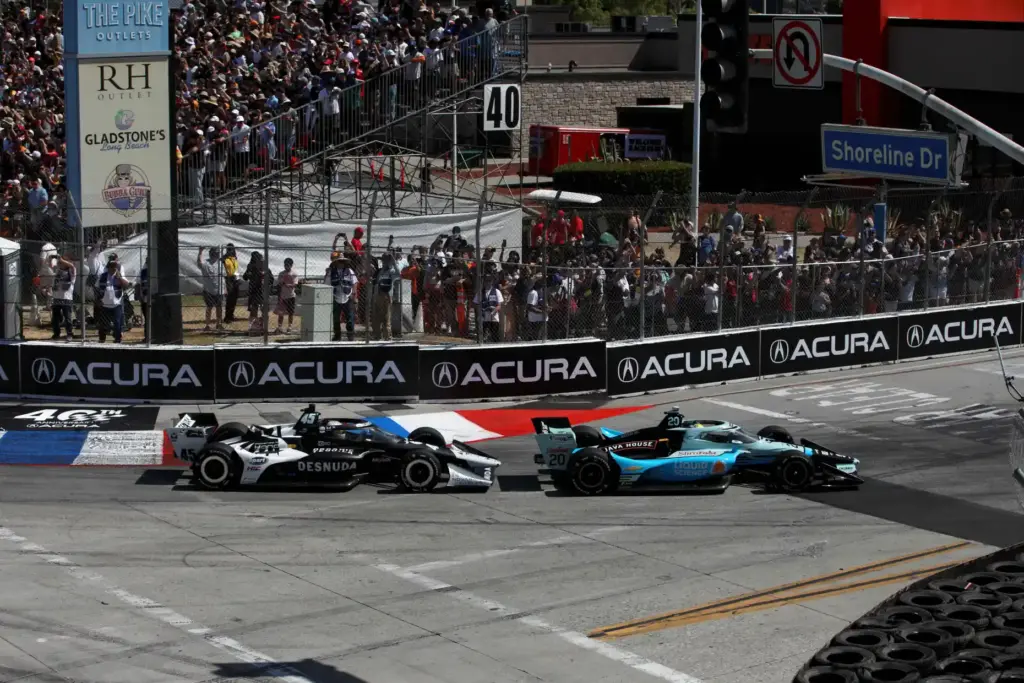 IndyCars make the first turn off Shoreline Drive during the...