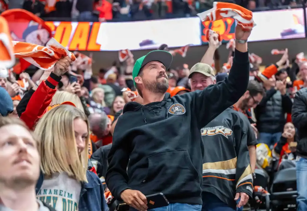 Ducks fans celebrate a goal by Mikael Granlund, not pictured,...