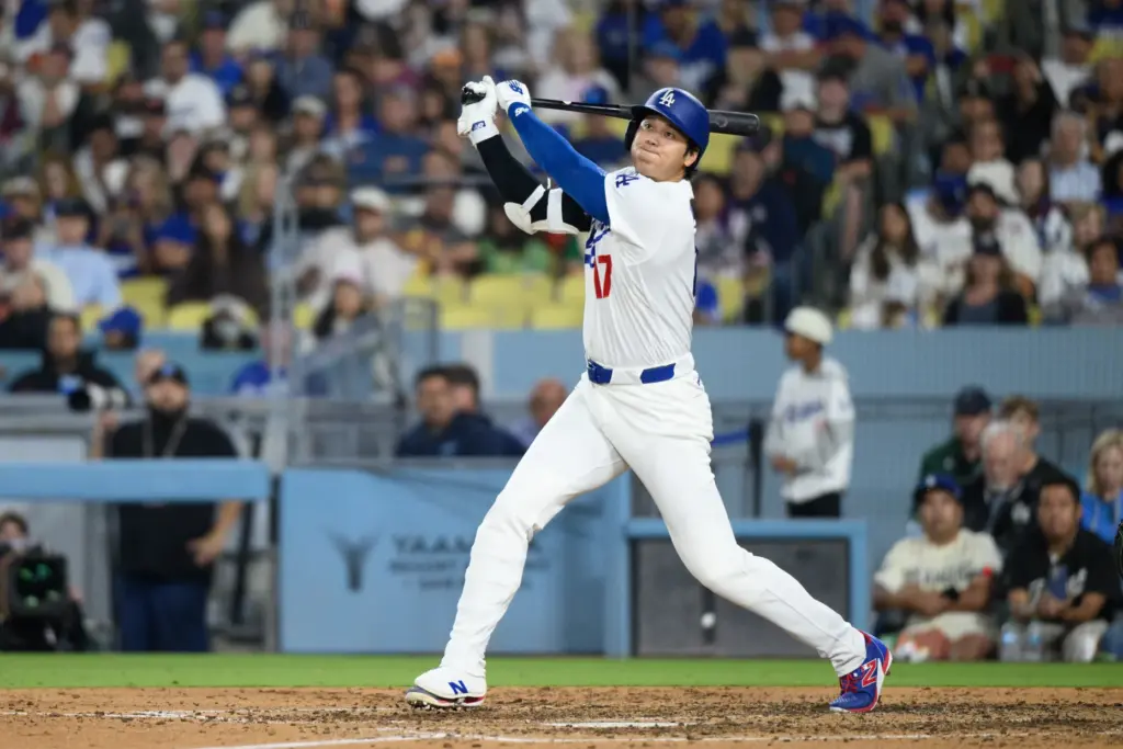 Dodgers star Shohei Ohtani hits a foul ball during the...
