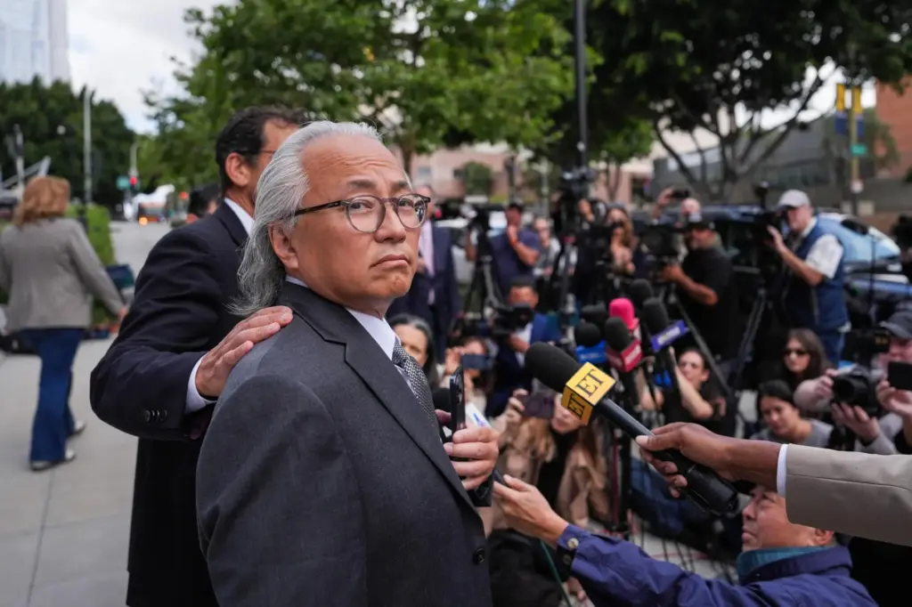 Kenneth Iwamasa, one of five people who pleaded guilty in...
