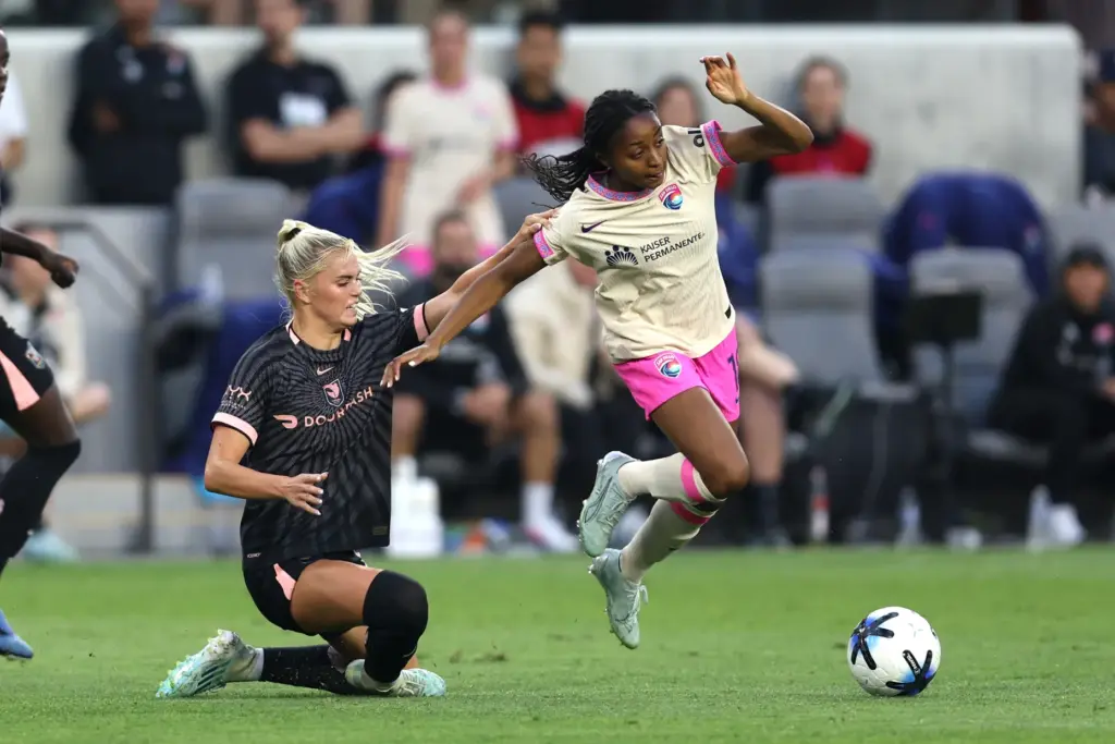 Angel City FC forward Riley Tiernan, left, defends against San...