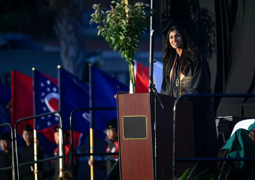 Reva Sobti delivers one of the senior commencement addresses during...